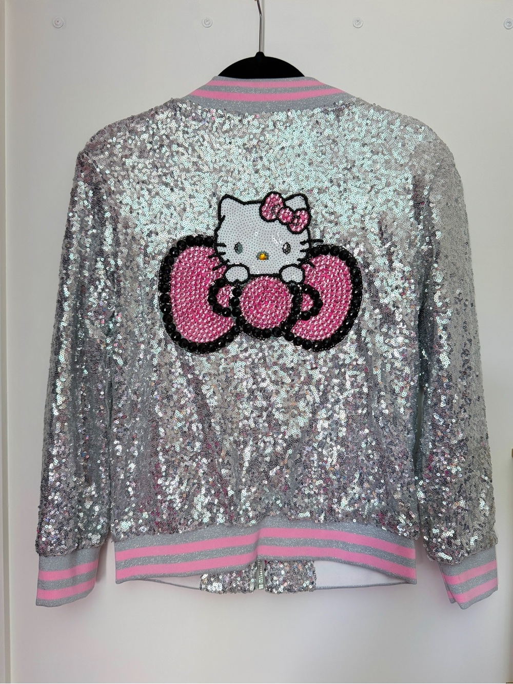 NWT Girl’s Lola + The Boys Hello Kitty Silver Sequin Bomber Jacket. Size 12.